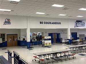 Ivy Hill Elementary posted their logos with their message in their colors in the commons. 