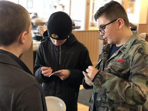 Olive students Interviewing a fellow student at Egg Harbor Cafe in Downtown Arlington Heights. 